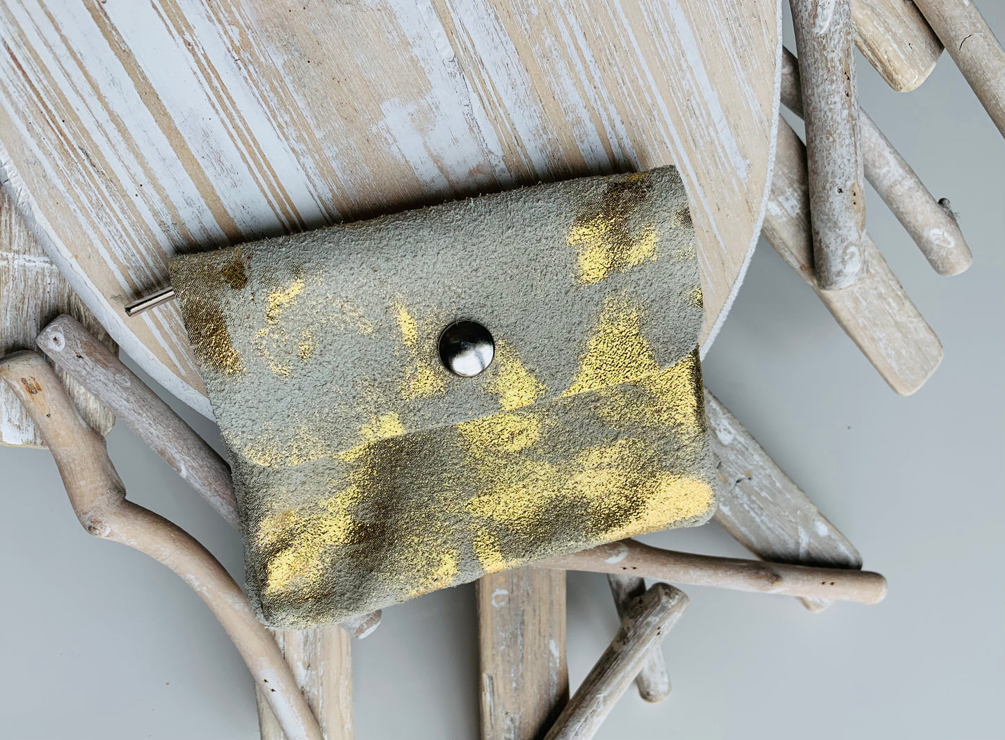 PORTE MONNAIES ET CARTES CUIR TACHETÉ BEIGE DORÉE.